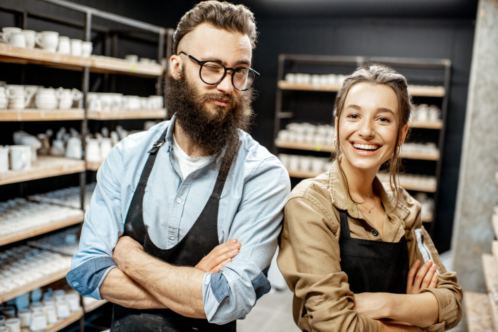 Man and woman in the pottery shop